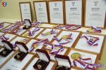 Церемония награждения золотыми медалями. Медали. грамоты, часы